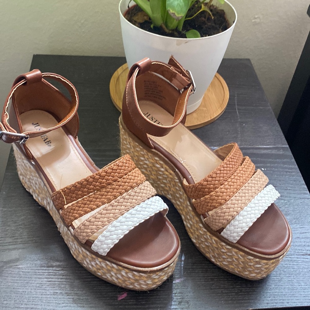 Brown high wedges. Never worn